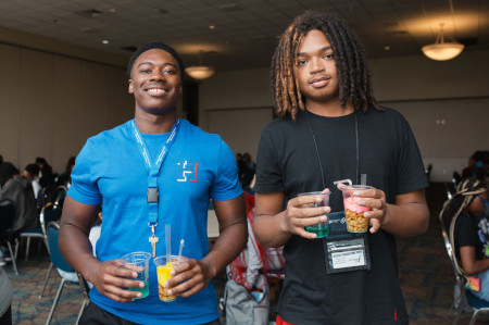 Students doing science experiments at STEM camp