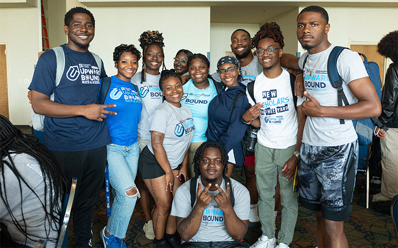 Students smiling at camera