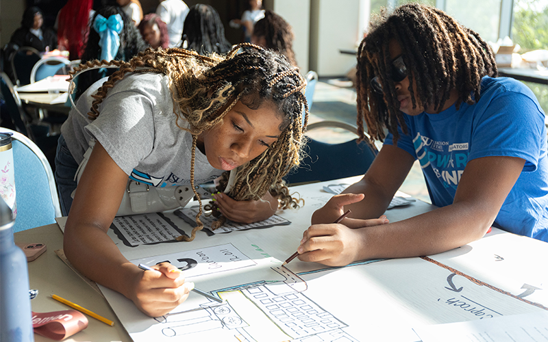 Students working on presentations