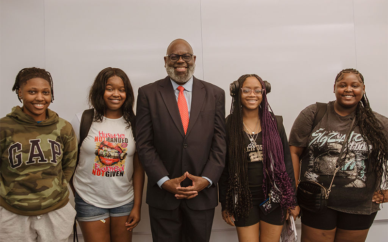 Students smiling at camera