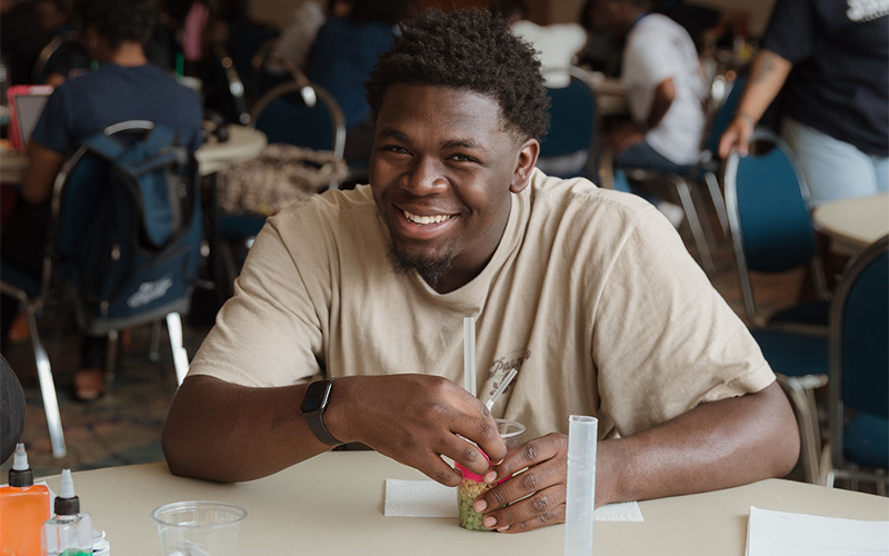 Students building reservoirs