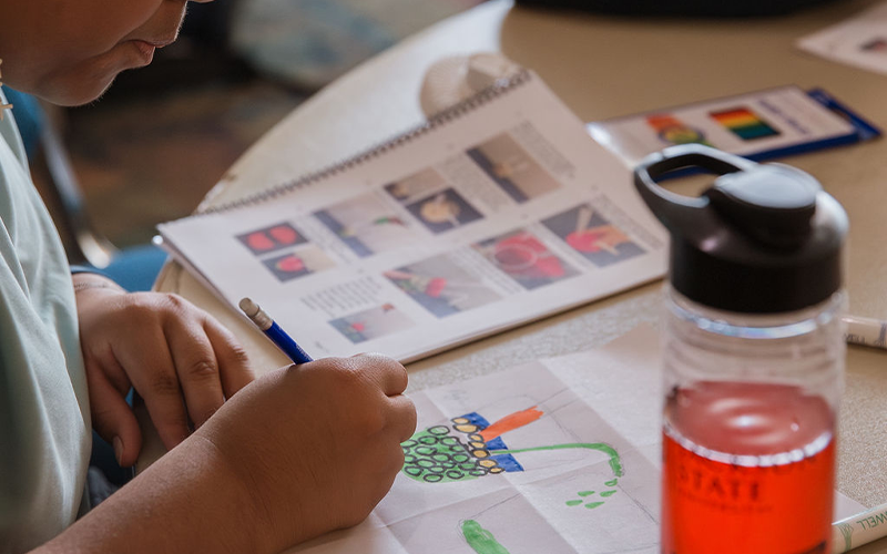 Students building reservoirs