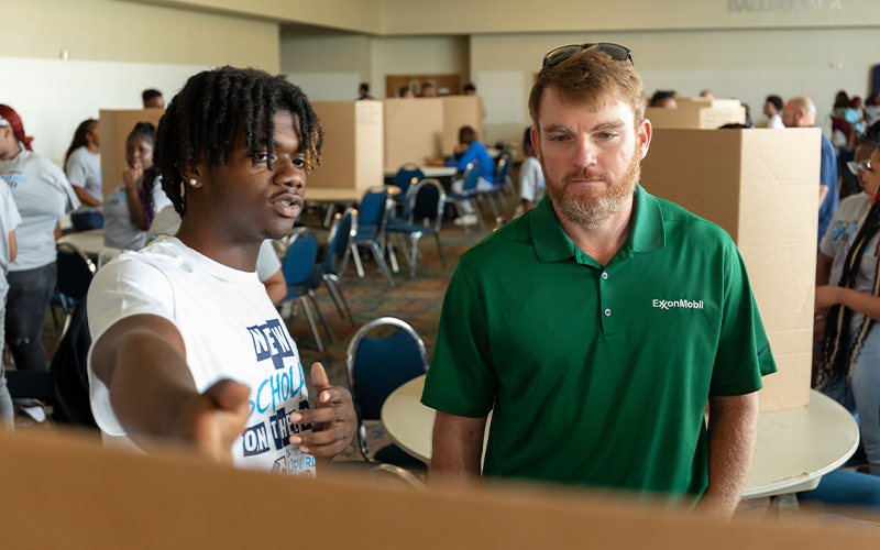 Students giving presentations