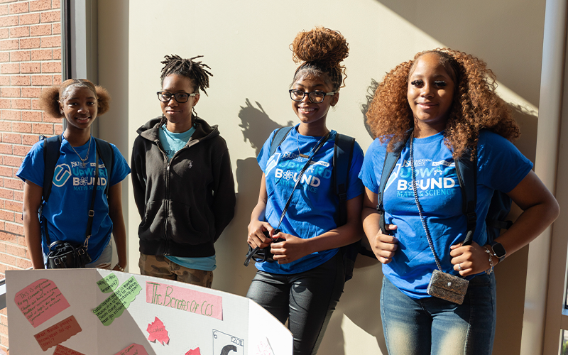 Students smiling at camera