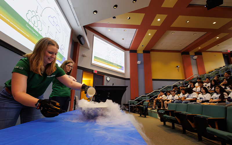 Students building reservoirs