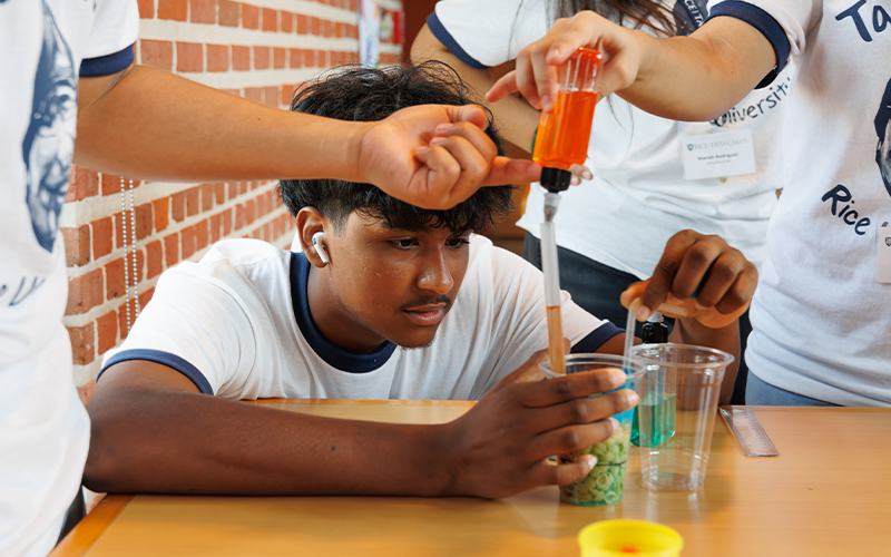 Students building reservoirs