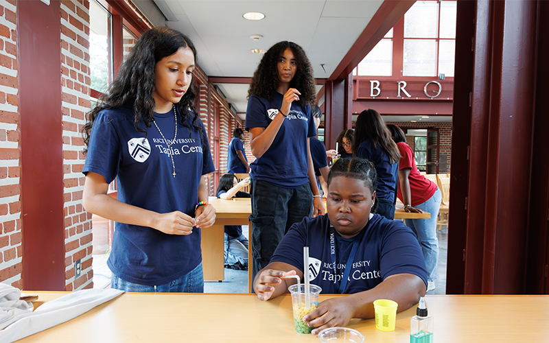 Students building reservoirs