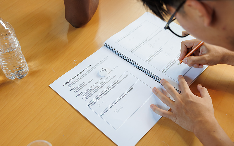 Students building reservoirs