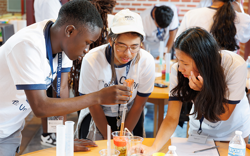 Students building reservoirs