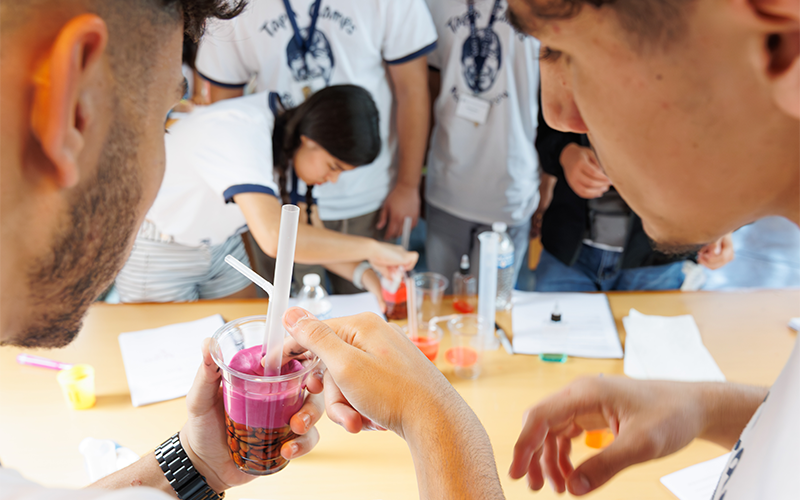 Students building reservoirs