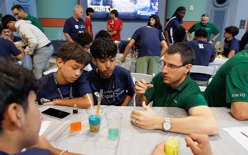 Students building reservoirs