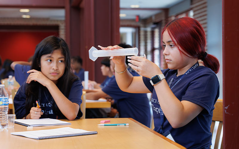 Students building reservoirs