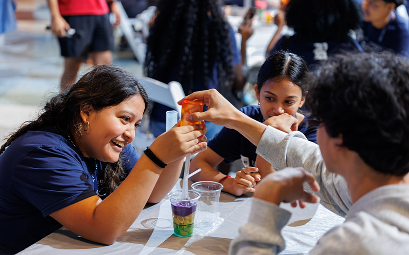 Students building reservoirs