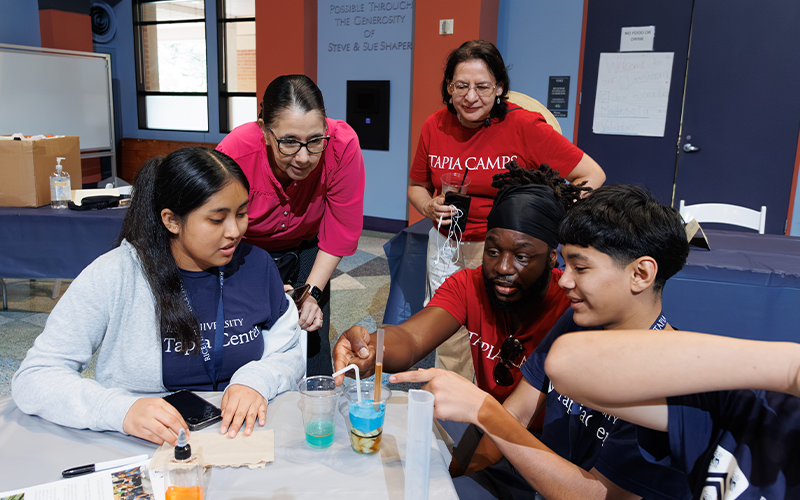 Students building reservoirs