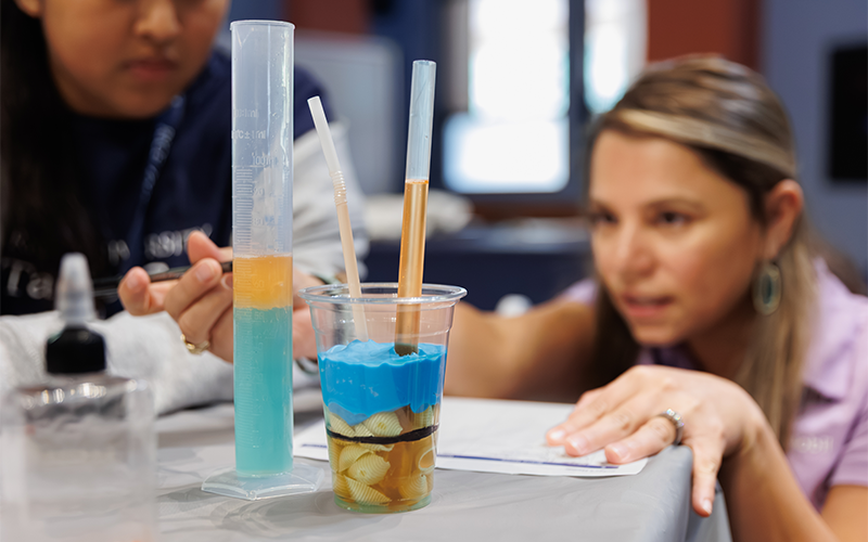 Students building reservoirs