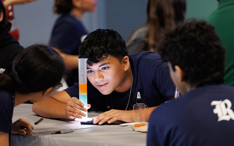 Students building reservoirs