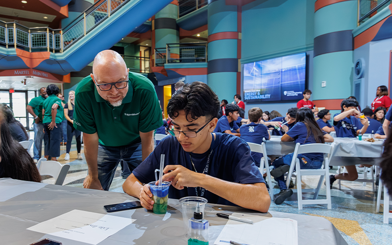 Students building reservoirs