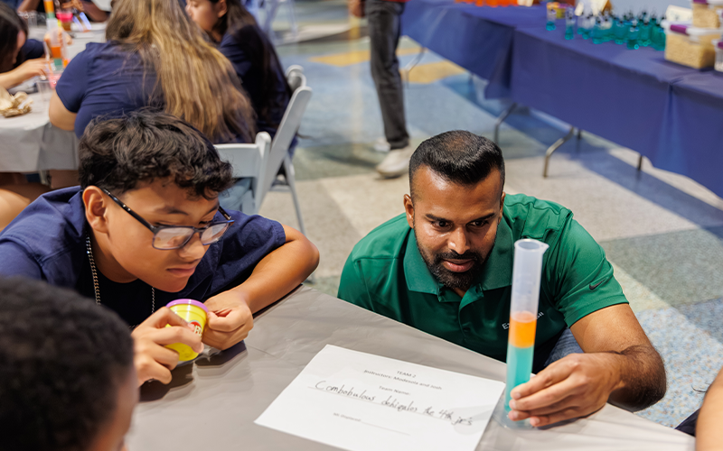 Students building reservoirs