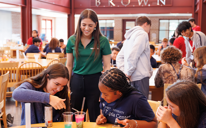 Students building reservoirs