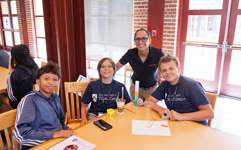 Students building reservoirs