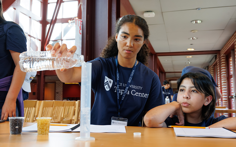 Students building reservoirs