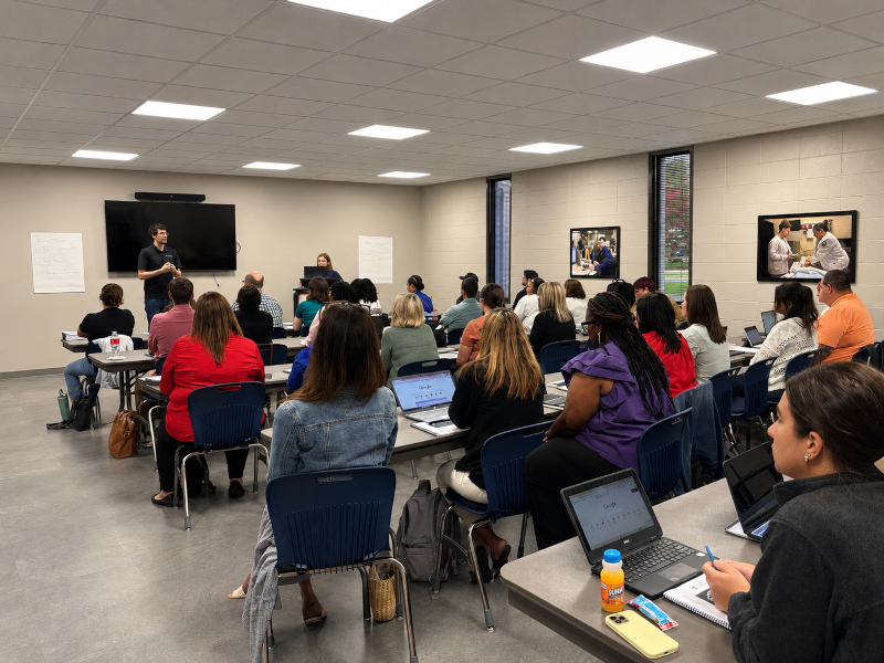 Educators listening to presentation