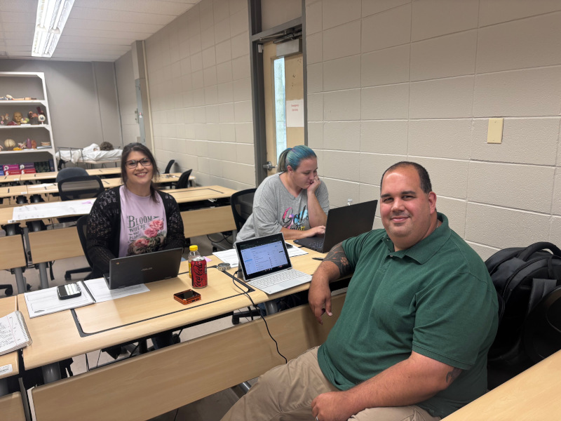 Educators working on projects