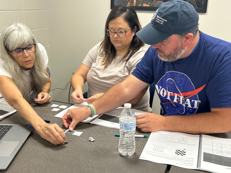 Educators working on projects