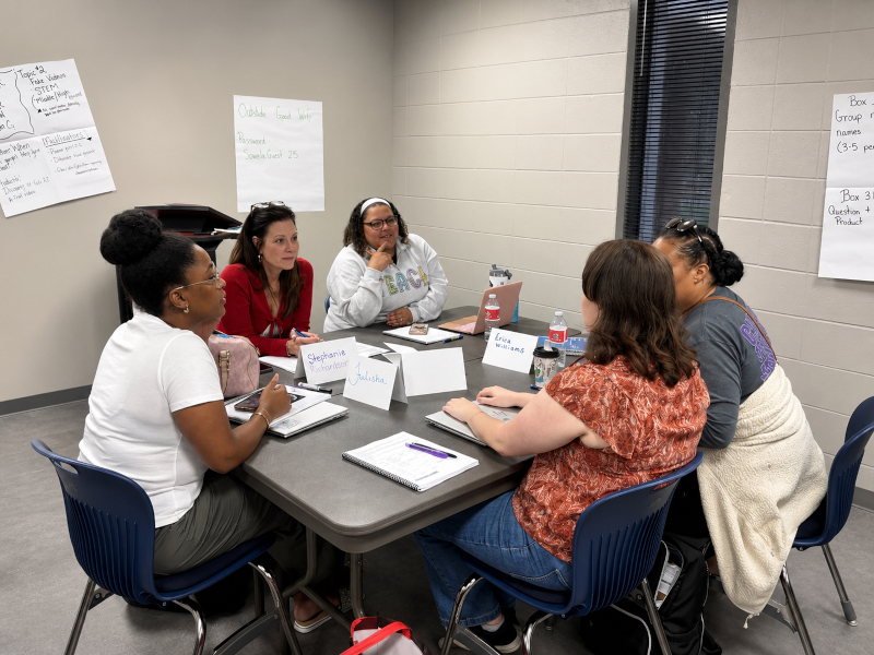 Educators working on projects