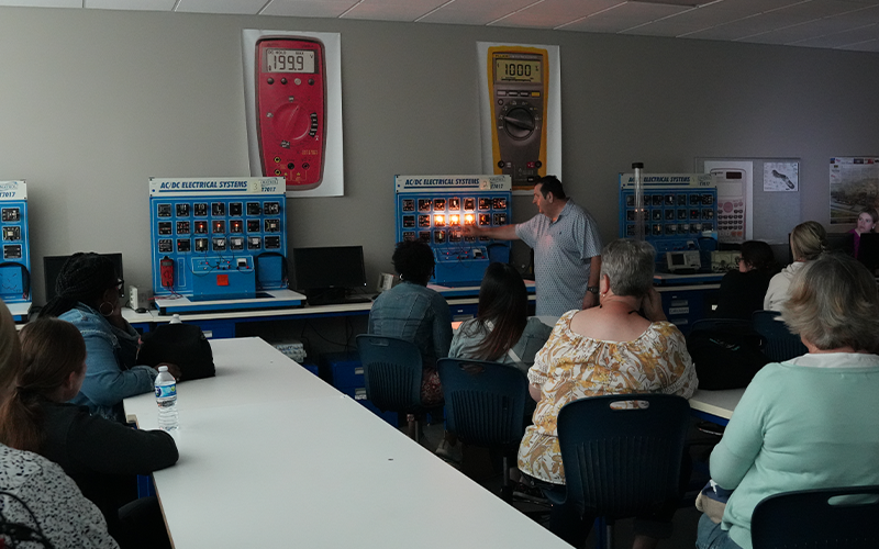 Educators listening to presentations