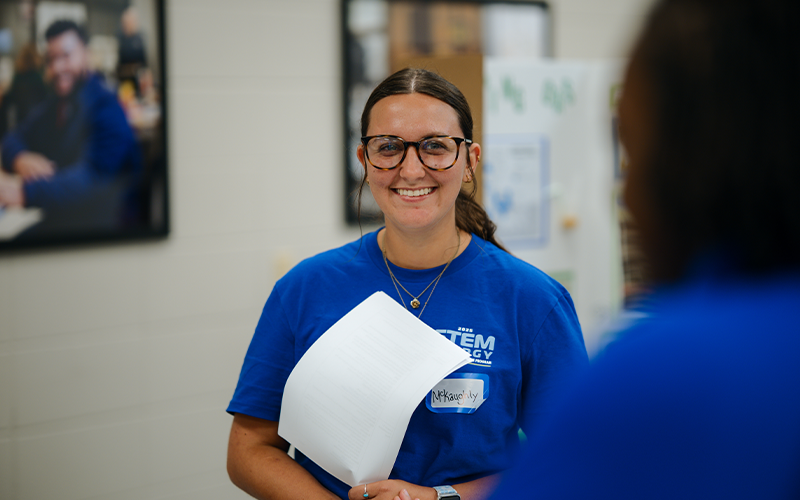 Educator preparing for presentation