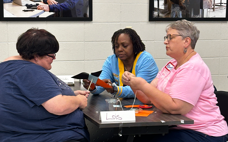Educators working on presentation