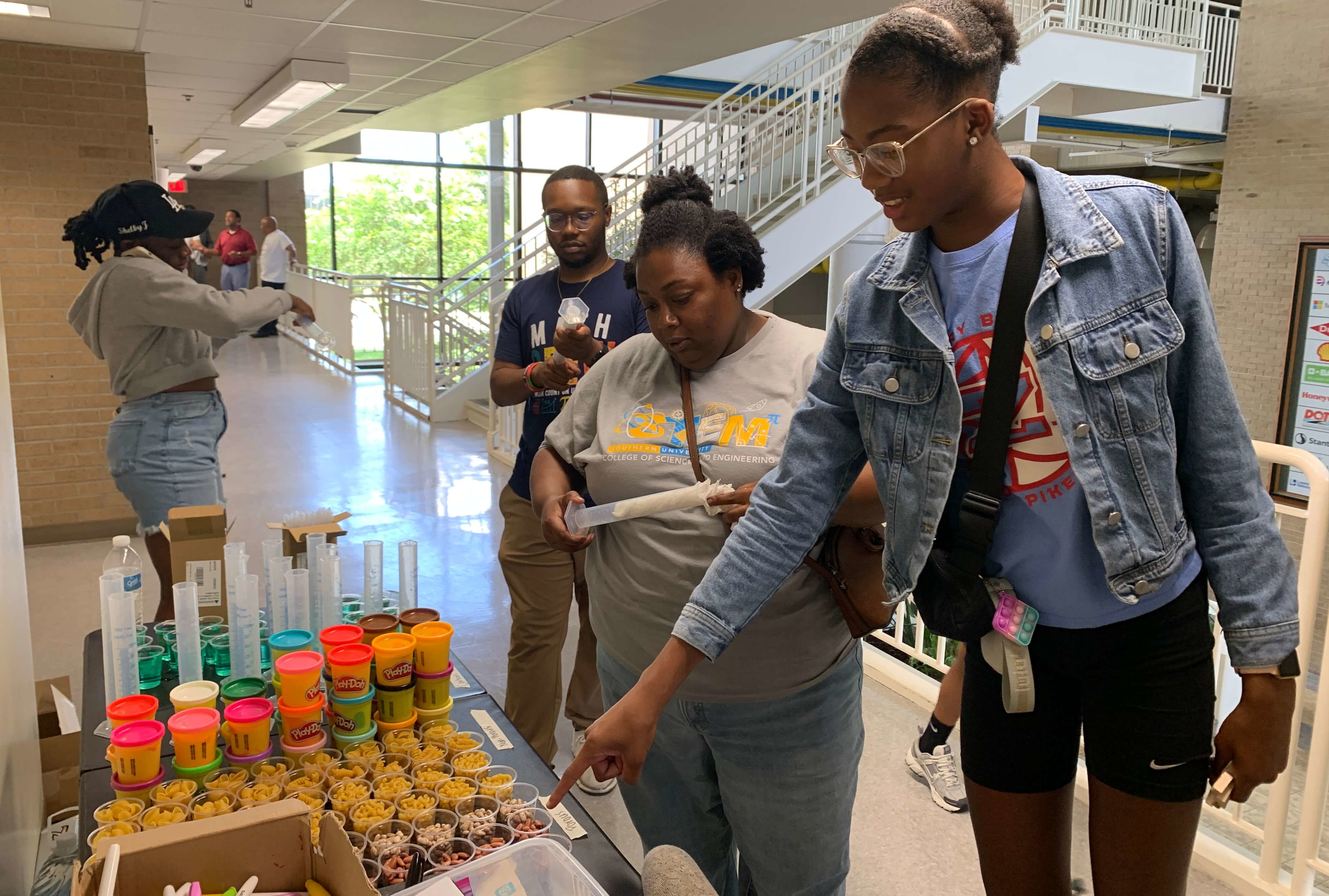 Students doing science experiments at STEM camp