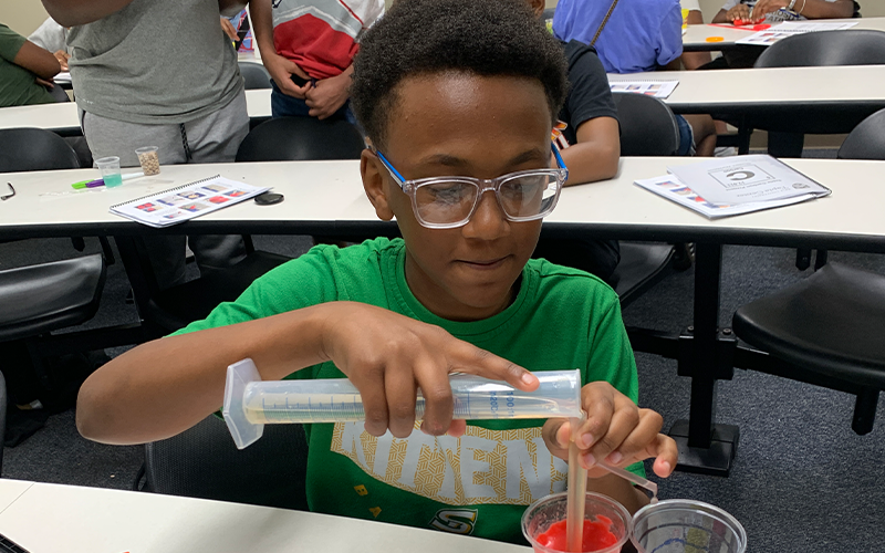 Students testing reservoirs