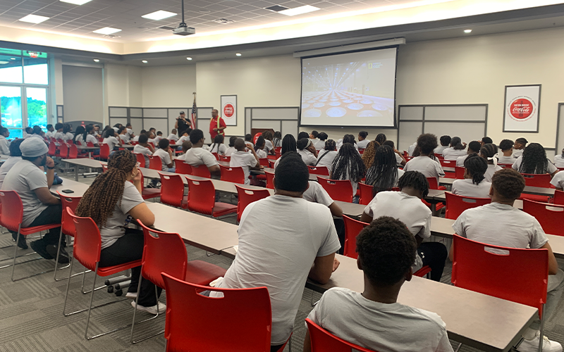 Students listening to presentation